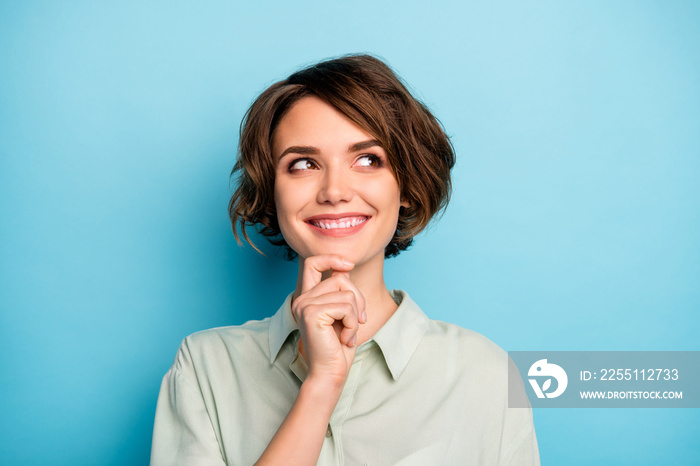 Closeup photo of funny beautiful lady short hairdo look empty space have creative business startup idea arm on chin wear casual green shirt isolated blue color background