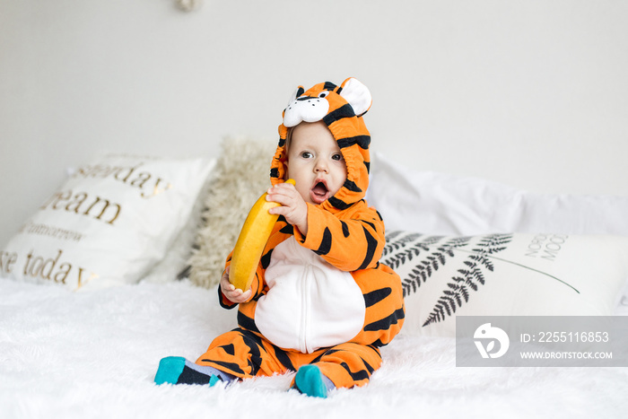 baby wearing tiger suit