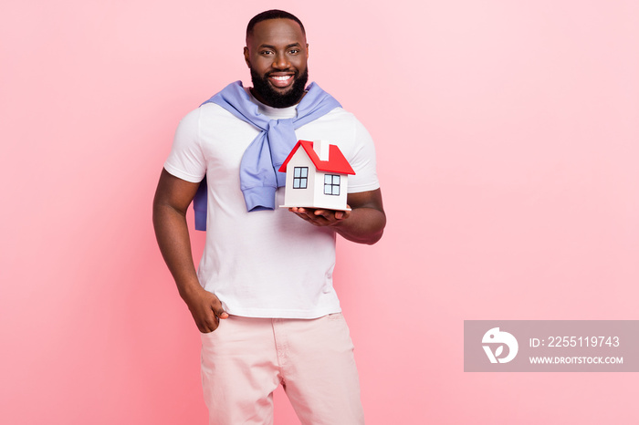 Photo of handsome attractive male insurance agent working in real estate sales manager isolated on pink color background