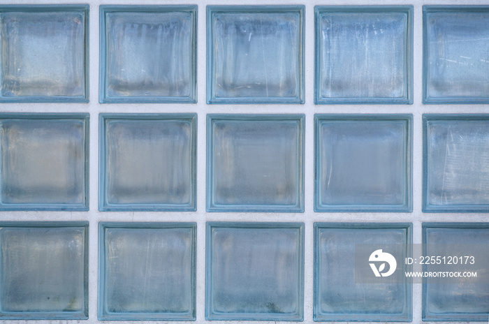 Window is made of Transparent glass bricks. Pattern of glass block wall