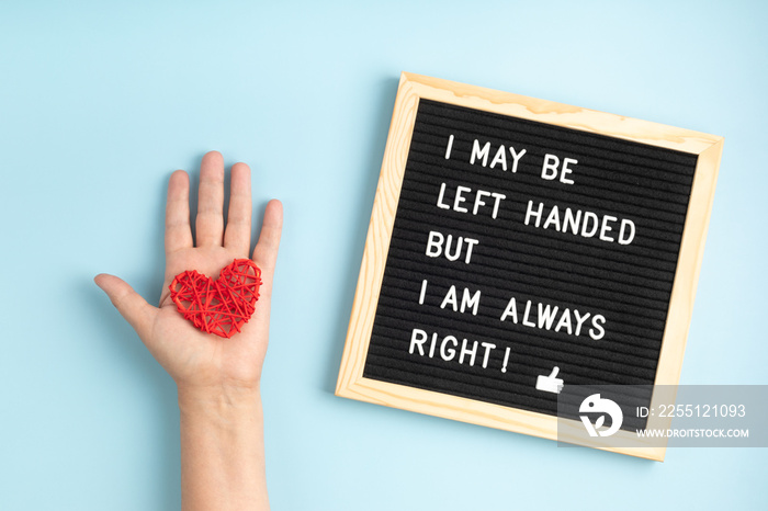 Felt board with text I may be left handed but I am always right. Left handers day concept