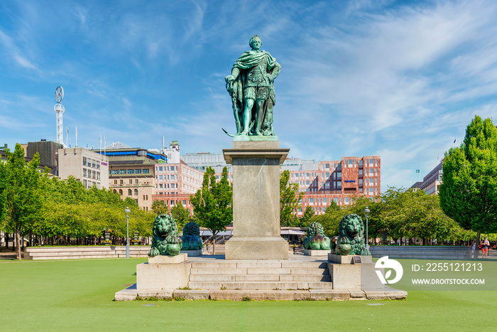 Statue of King Carl XIII mediating King’s Garden, Kungstradgarden, or Kungsan, a park in Norrmalm district, central Stockholm, in a sunny summer day, Stockholm, Sweden