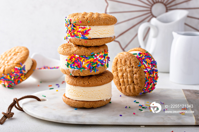 Ice cream and cookies sandwiches stacked on the table