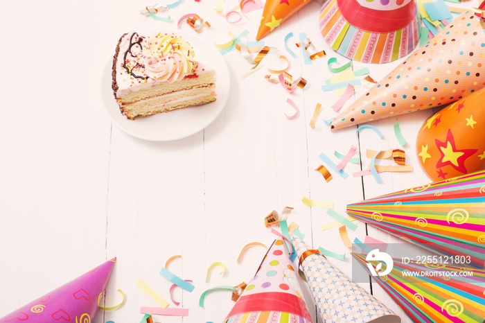 birthday cake and  decoration on white wooden background