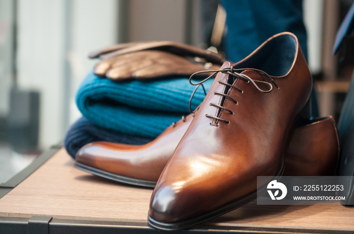 closeup of classic leather shoes for men in fashion store showroom