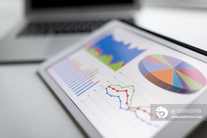 Tablet with business statistic chart