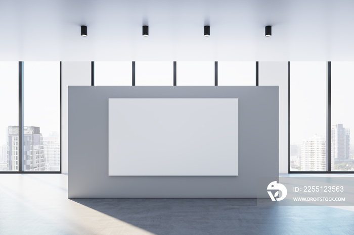 Front view on blank white poster with place for your text or logo in sunlit spacious empty hall with concrete floor and city view from panoramic windows. 3D rendering, mock up