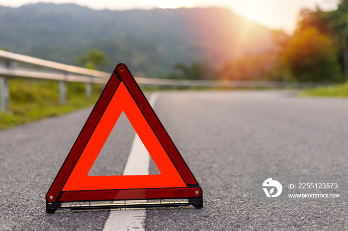 Red triangle, red emergency stop sign, red emergency symbol on road. With copy space for text or design