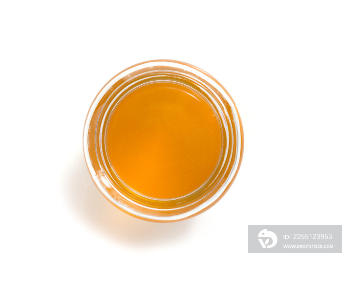 jar of honey on white background