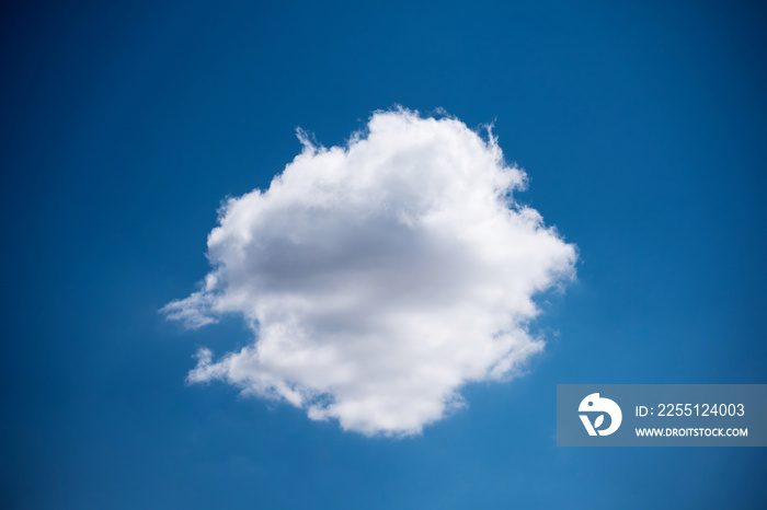 Single white cloud circle shape on blue skyshape,