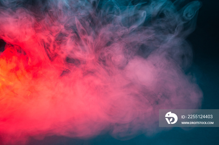 Colorful smoke on a black background closeup