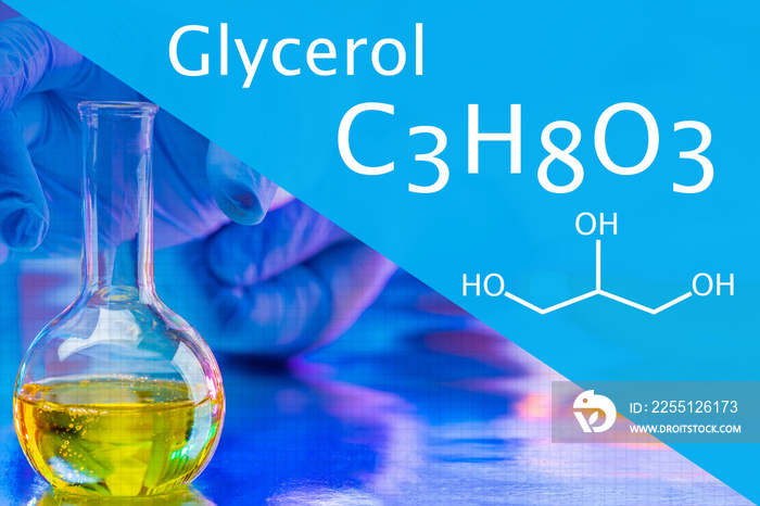 Glycerol on a blue background. C3H8O3. Creating cosmetics using glycerin. Glycerin in detergents. Household chemicals containing glycerin. Test tube with detergent base. Yellow liquid test tube