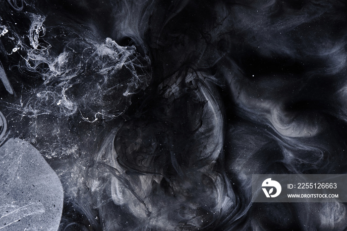 Abstract black and white swirling smoke background. Cumulus thunderclouds, mysterious and frightening sky. Paints colors of depression and negative emotions