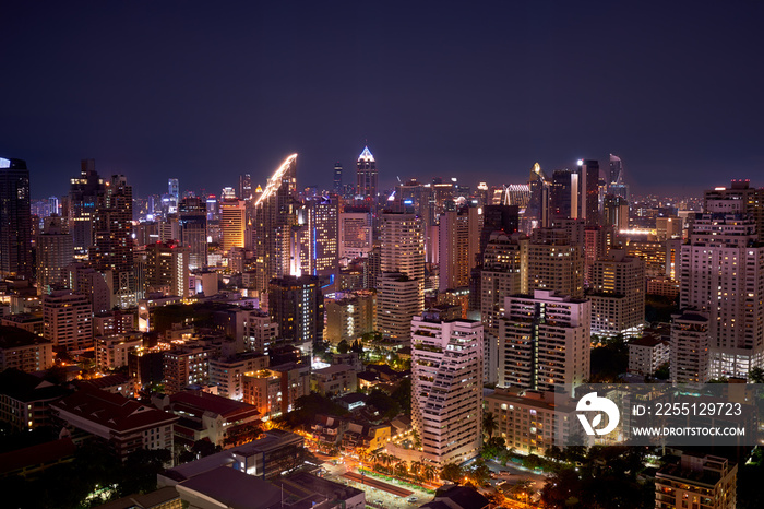 night urban cityscape view of high building rooftop