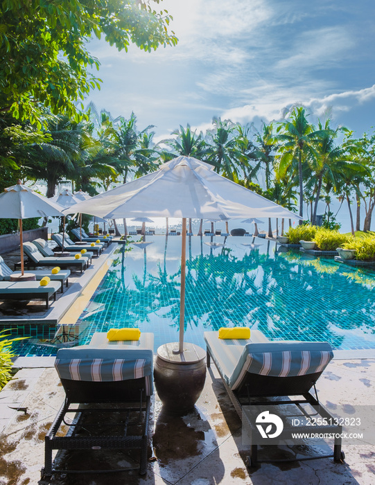 tropical pool with palm trees