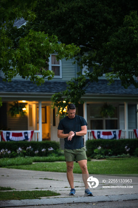 Air Force service member sets out for a morning run to train for his PT Fitness test.