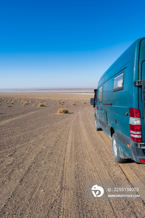 Silk Road landscapes. Overland travel by campervan is an excellent experience to enjoy with the family. Pictures of Dasht-e Kavir desert Iran