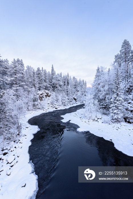 The river in winter season at Oulanka National Park, Finland.