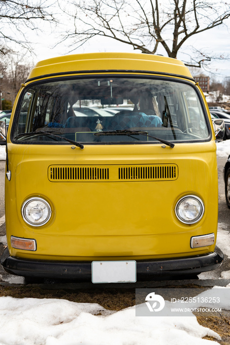 Classic vintage yellow transporter camper van parked in Portsmouth NH