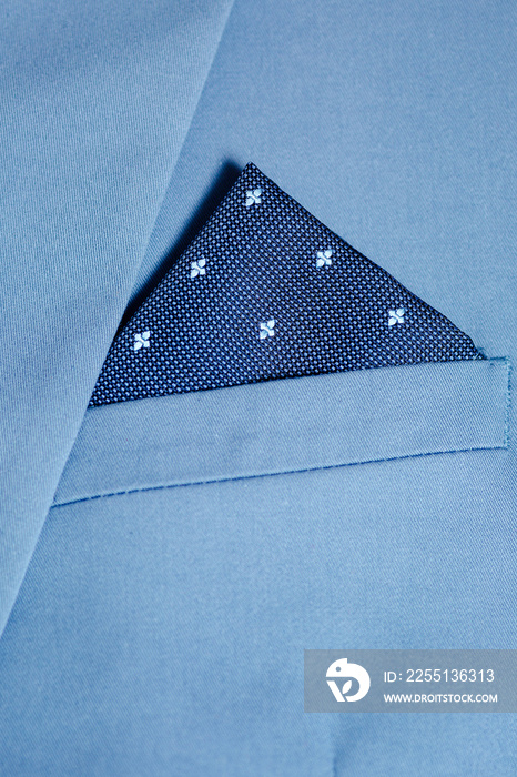 Close up of men’s suit with pocket square.
