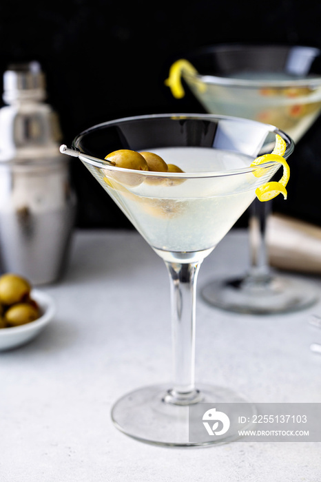 Classic lemon drop martini with olives and lemon