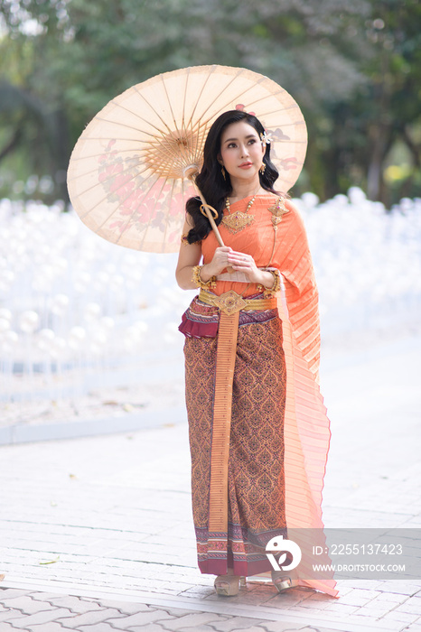 Beautiful girl in White Thai dress