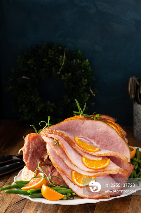 Christmas honey glazed ham served on a plate