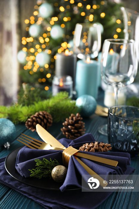 New Year table setting with bokeh on wooden table