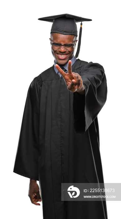 Young graduated african american man over isolated background smiling looking to the camera showing fingers doing victory sign. Number two.