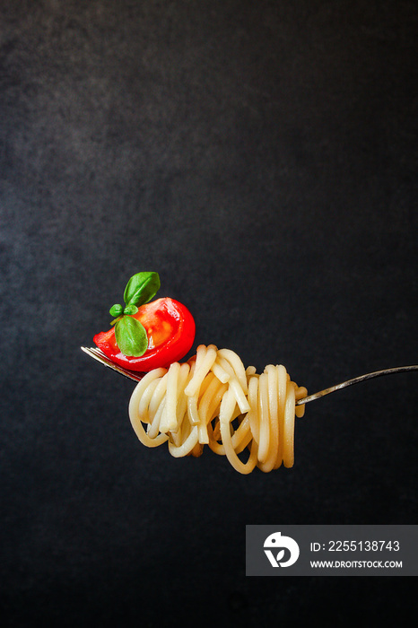 pasta spaghetti with tomato and basil, Menu concept healthy eating. food background top view copy space