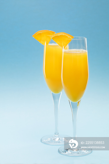 Two glasses of mimosa cocktail