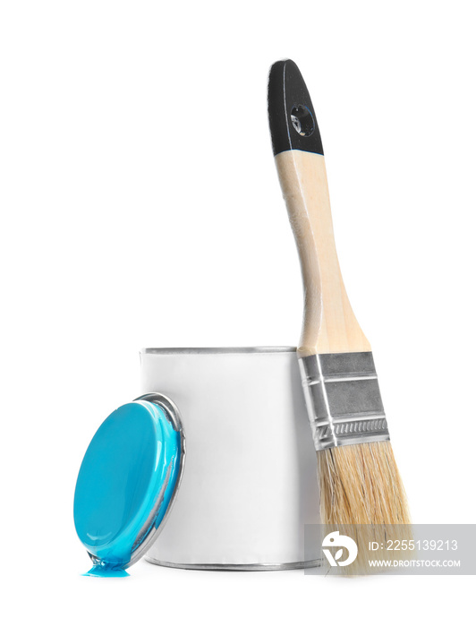 Can of blue paint and brush on white background