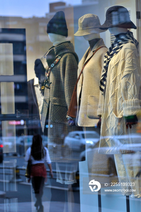 Autumn and winter clothes displayed in a clothing store