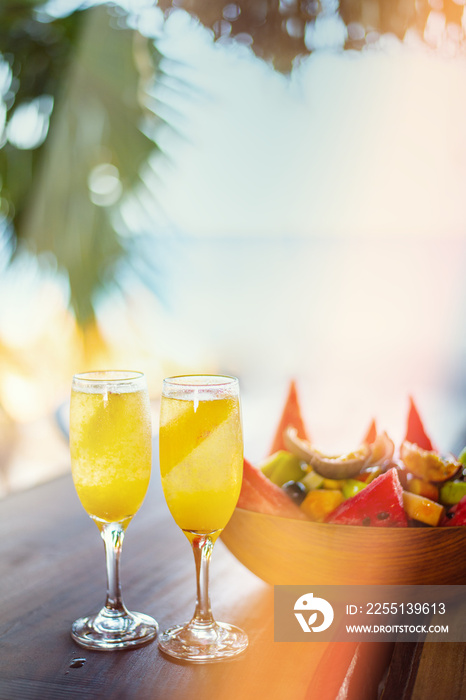 Refreshing orange Mimosa cocktails with champaigne