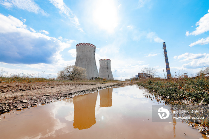 Nuclear power plant on the coast. Ecology disaster concept.