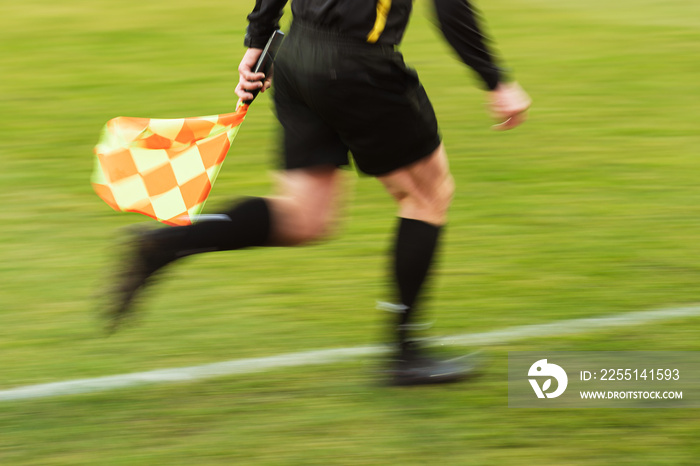 Assistant referee during football match