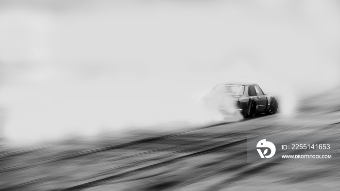 Blurred old car drifting, Sport car wheel drifting and smoking on blurred background. Motorsport concept.