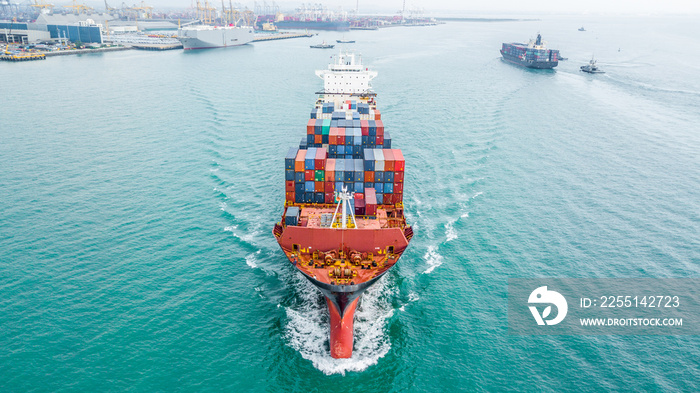 Aerial view container cargo ship carrier, Boat business commercial import export commerce logistic and transportation of International by container cargo ship in the open sea.