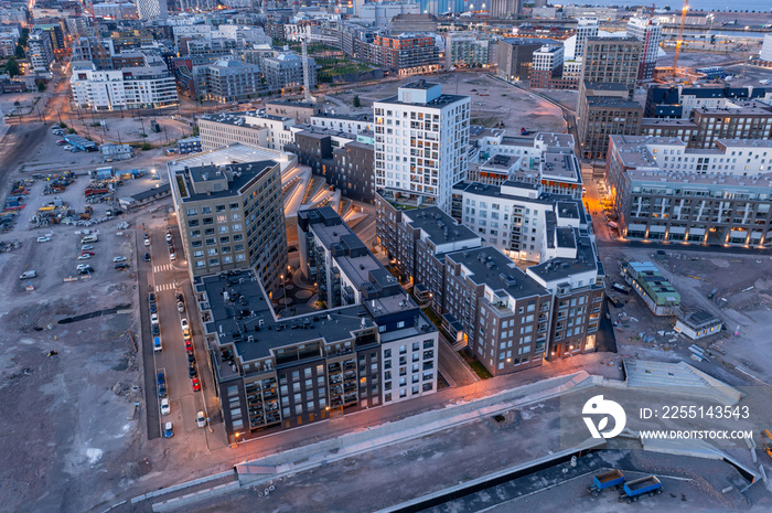 Aerial view of the brand new neighborhood Jatkasaari in Helsinki. Modern Nordic Architecture in Finland. Construction of the neighborhood continues.