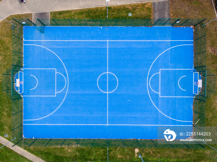 Aerial view of basketball court without players in public park in St Mellons Cardiff UK. Top view of basketball court