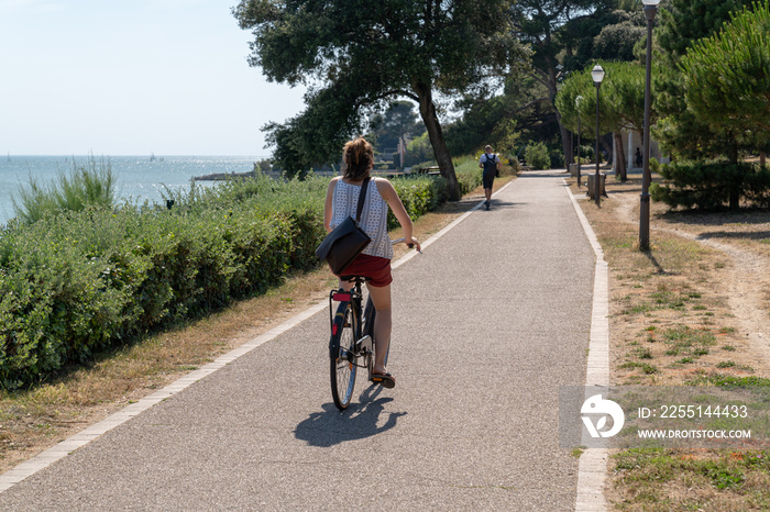 alley ride bikeway for pedestrian and bike in La Rochelle France near Atlantic ocean