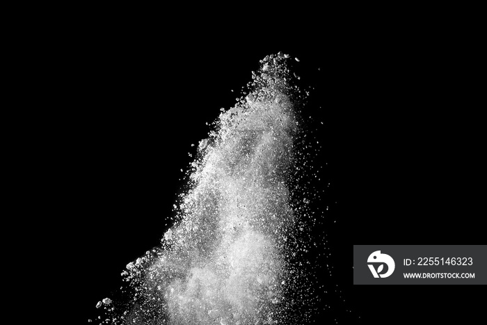 Explosion of white dust on black background.