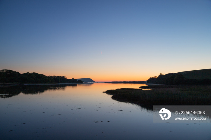 Sunset over Newport estuary in Pembrokeshire, Wales