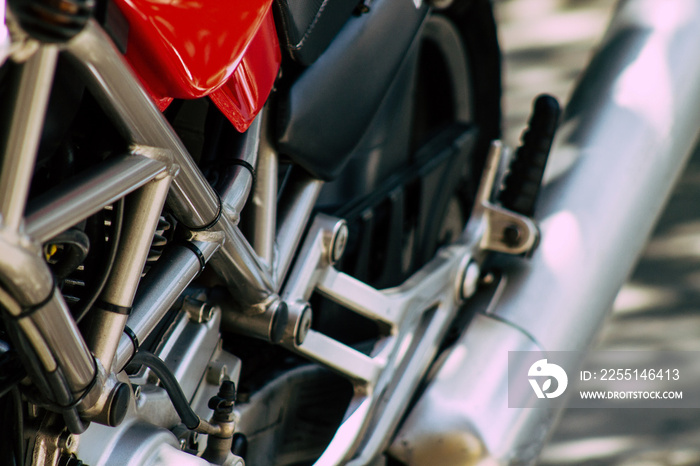 Closeup of a motorcycle parked in the streets of the city center of the metropolitan area