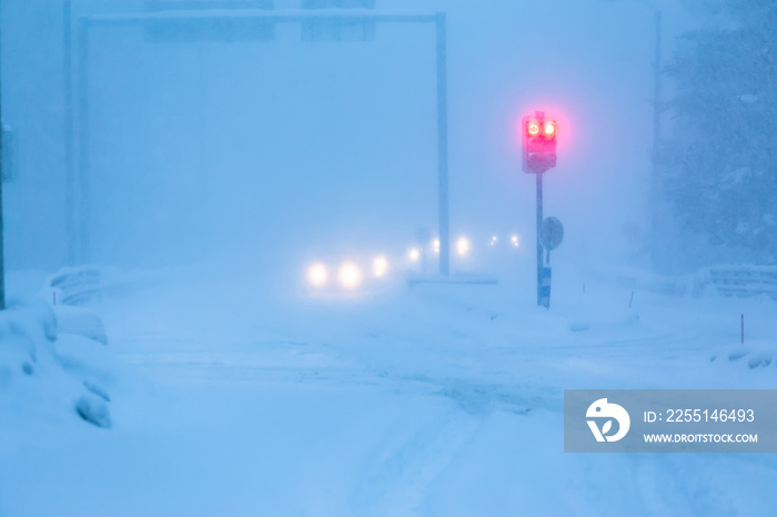 Bad weather traffic in snow storm. Sotkamo, Finland.