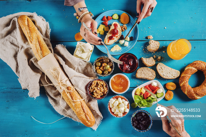 Delicious traditional turkish breakfast on blue wooden table