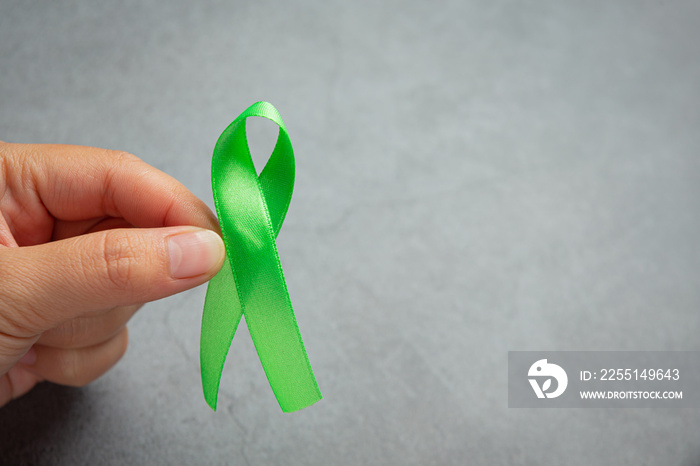 Green ribbon. Glaucoma awareness month