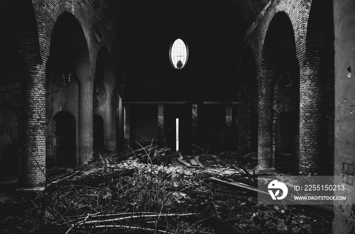 Ruins of the old church near Lviv, Ukraine. Concept of chaos, evil, and destruction. Black and white