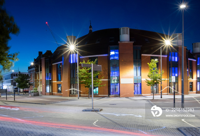 The newly redeveloped Swindon Library illuminated at dusk in Swindon, Wilts, UK