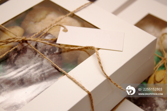 packed boxes with cookies tied with rope